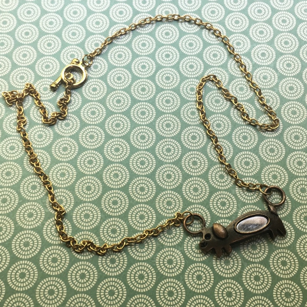 Mirrored wiener dog pendant on vintage gold tone
